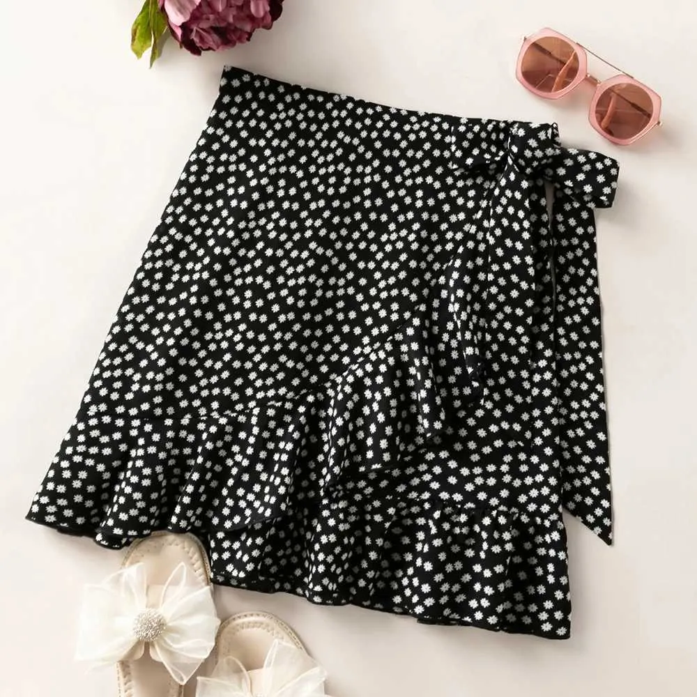 Kjolar kvinnor polka dot floral båge kort lös veckad kjol2429