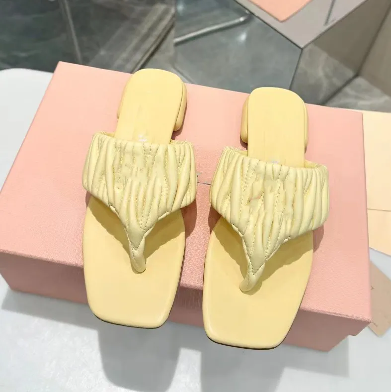 tasarımcı kadın plaj terlik tasarımcı kadın ayakkabıları klasik düz topuk yaz tembel metal çizgi film büyük kafa floplar deri bayan slaytlar otel banyo bayan sandaletler terlik