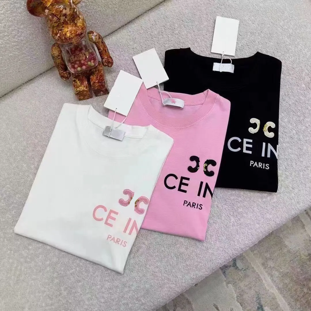 Camiseta de moda de venta caliente para hombres y mujeres, versión coreana de manga corta y versátiles de manga corta, moderna, de moda y adelgazamiento, algodón puro de gran tamaño de manga corta