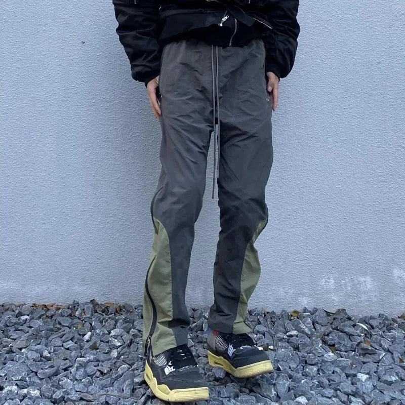 Pantaloni maschili hip hop cerniera cargo per uomini harajuku pista di moda simil coulistica adatta a gambe dritte gambe wead street