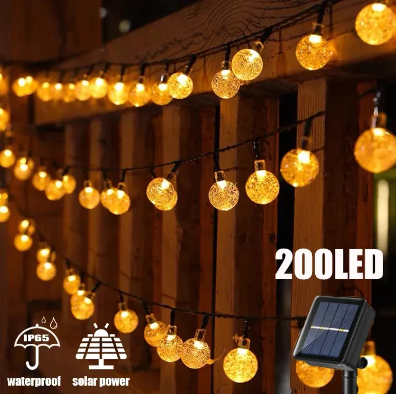 Décorations Lumières de cordes solaires extérieures 200 LED Crystal Globe Lights Solar Solar Festoon Fairy Light for Garden Christmas Ramadan Decor