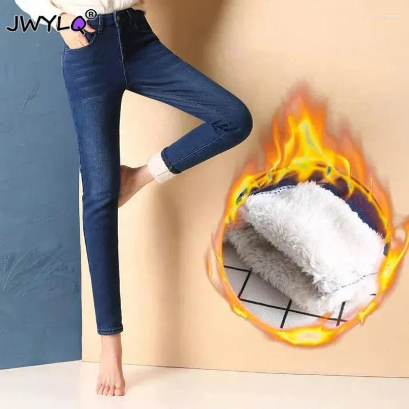 Kvinnors jeans överdimensionerade 34 plus sammet smala stretch kvinnor byxor höst vinter tjock varm blyertspenna denim kvinnlig hög midja vaqueros