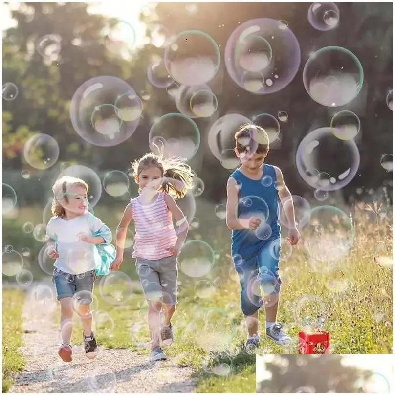 Nowate Games Electric Bubble Blower 12 Hole Fireworks Hine Portable With Light Sound Birthday Prezent Zabawki 240329 DROP PROVITY Prezenty Ga Dhfau