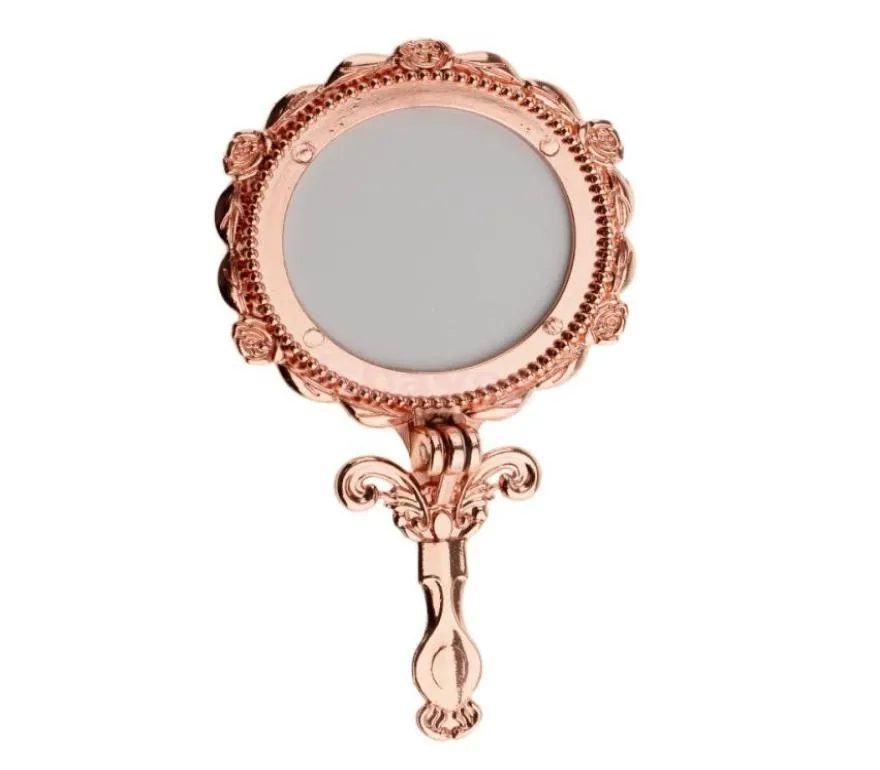 Mini miroir de maquillage de pliage cosmétique de style ancien vintage Miroir rose rond 7078392