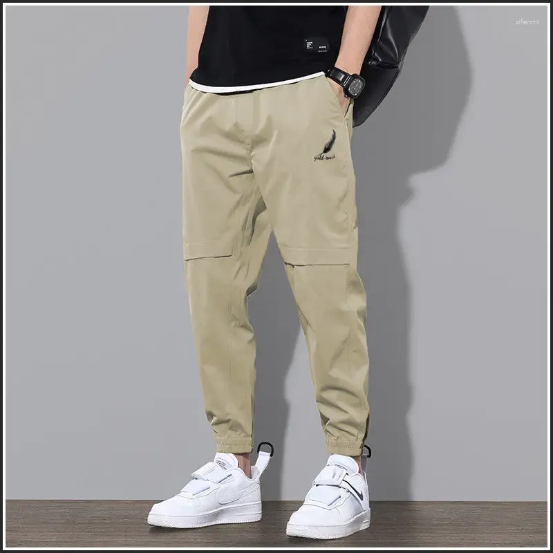 Calça masculina homens homens elásticos elásticos casuais Lápis de tamanho Oversize ao ar livre calça esportiva masculino Spring outono solto de pista de moletom de corrida solta