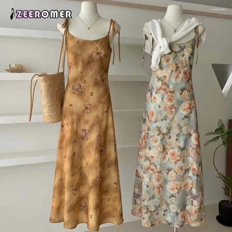 Casual Dresses 2024 Summer French Style Oil Painting Printed Bow Tied Strap Dress With Beach High Waist Slim And Elegant Temperamen