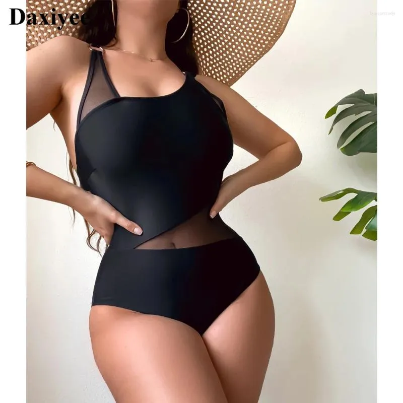 Damskie stroje kąpielowe 2024 Czarne jednoczęściowe strój kąpielowy Seksowne siatki Kobiety Kobiety do kąpieli Kąpiec Solidna patchworka żeńska monokini na plaży