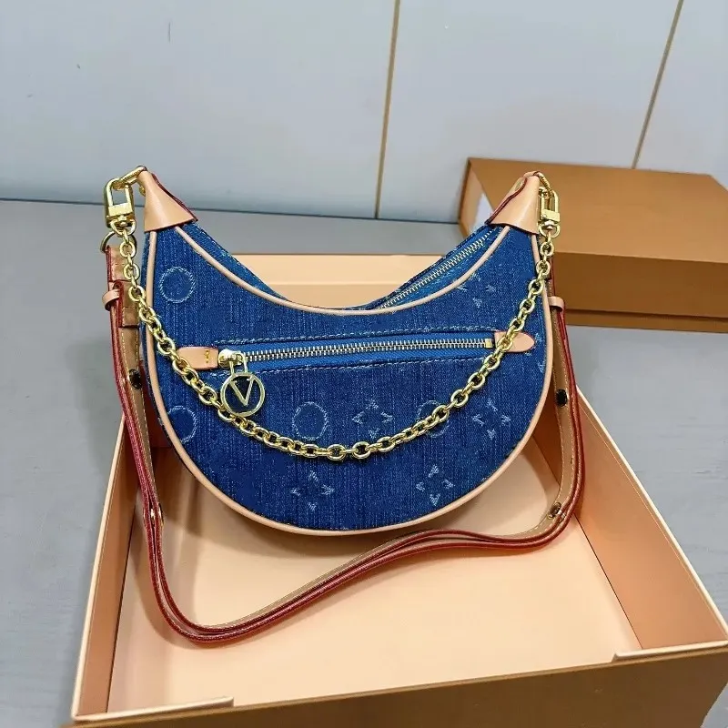 Yüksek kaliteli kadınlar lüks tasarımcı kot bezelye çantası altı çanta kadın tote omuz çantası zinciri crossbody çanta sofistike şık 26cm