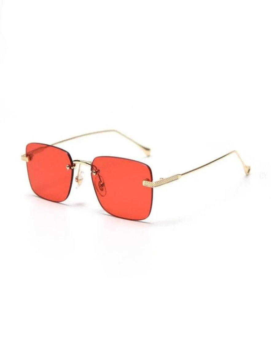 Красные тонированные солнцезащитные очки без оправы.