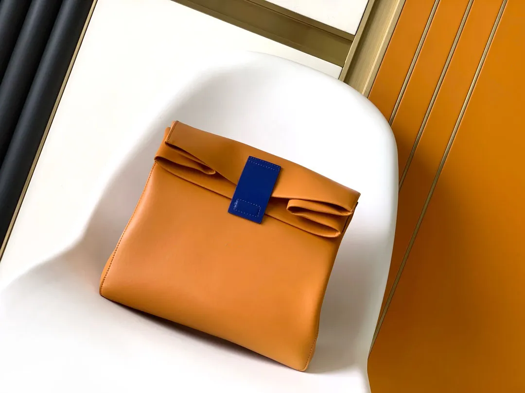 Orange clutch bag deals