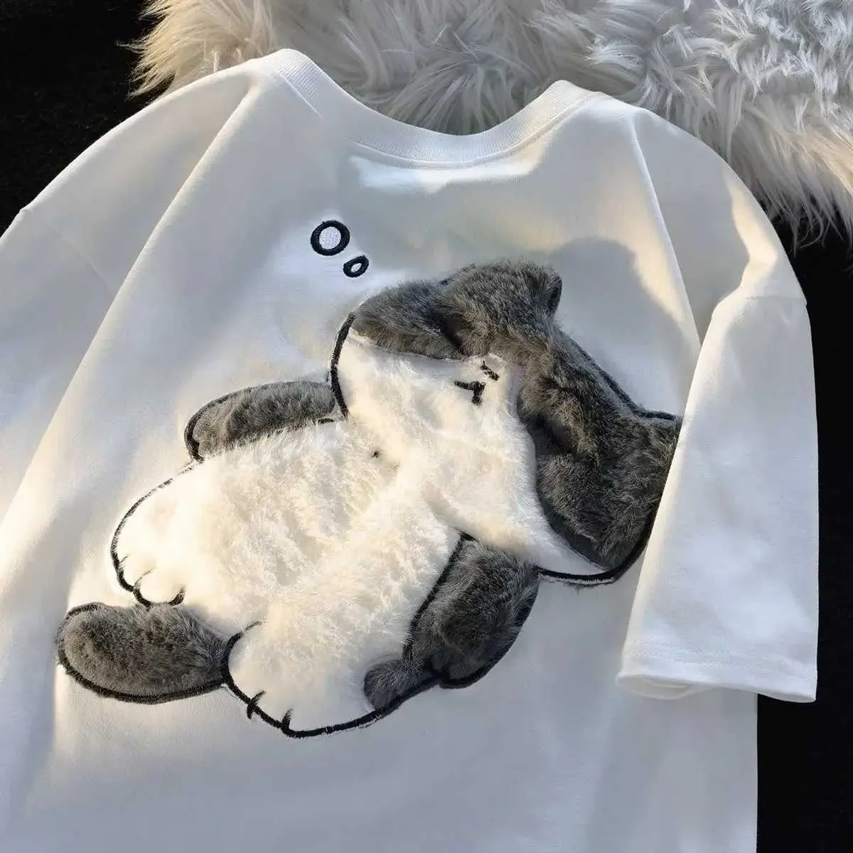 Camisetas para hombres Corea del Sur 2023 Nuevo patrón de gato Camiseta de verano Hombres y mujeres Tendencia retro de diseño