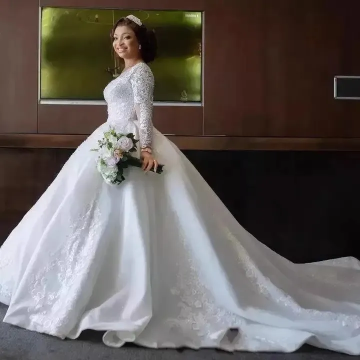 2024 Wunderschöne Perlen Perlen Hochzeitskleid Afrikanische Brautkleid Langarme Spitzen Applikationen Tüll Brautkleider Vestidos de Novias Custom Made gemacht