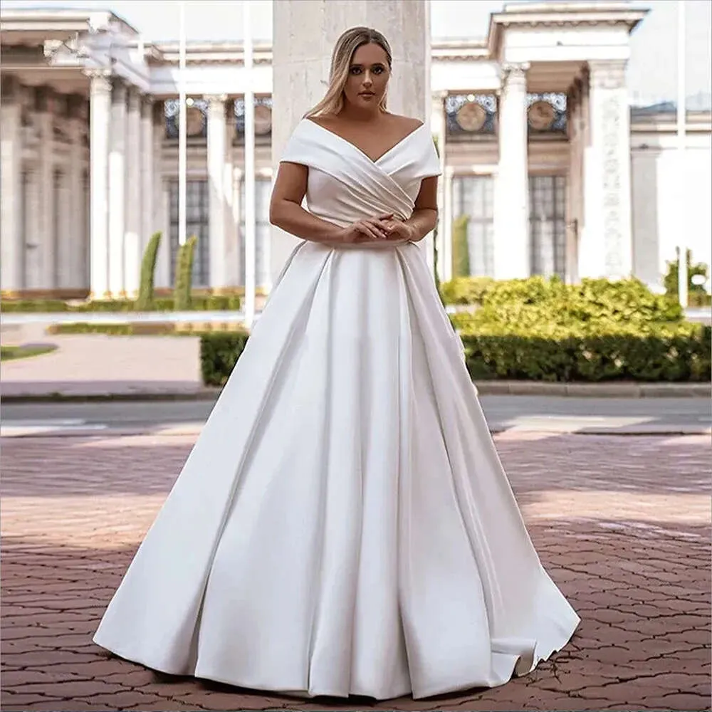 Elegant White Satin a Line Wedding Dress with Off-Shoulder V-Neckline, Lace-Up Back, Plus Size Option Elegant White Satin a Line Wedding Dress with Off-Shoulder V-Neckline, Lace-Up Back, Plus Size Option