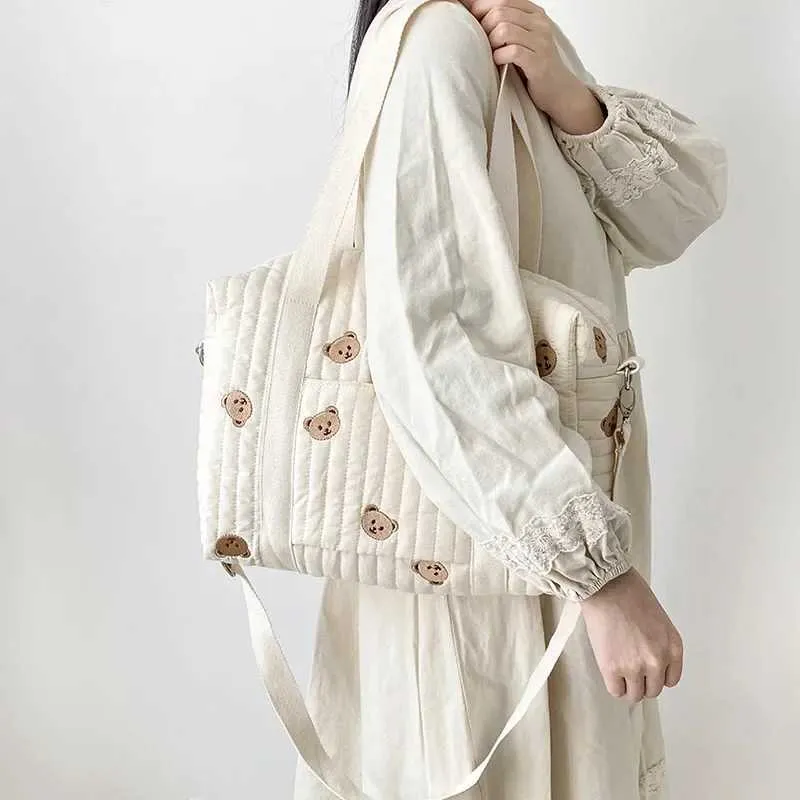 Bolsas de fraldas estilo corea recém -nascido baby care saco de fraldas bolsa de ombro bordado bordado de carrinho acolchoado Organizador de armazenamento de fraldas