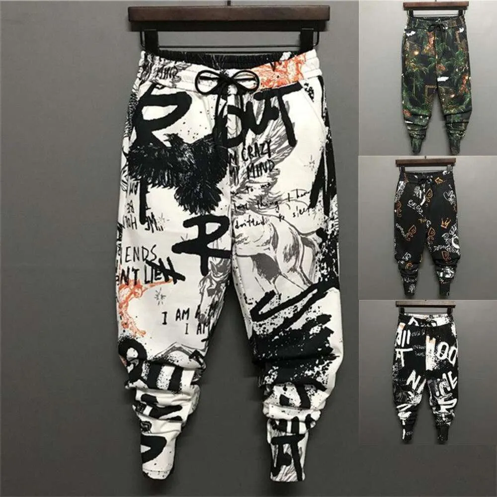 Mens Joggers Pants Personlig blommig koreansk version Harun Leggings Herrens sommartunntryck beskärda byxor Trendiga dragskon slimkar