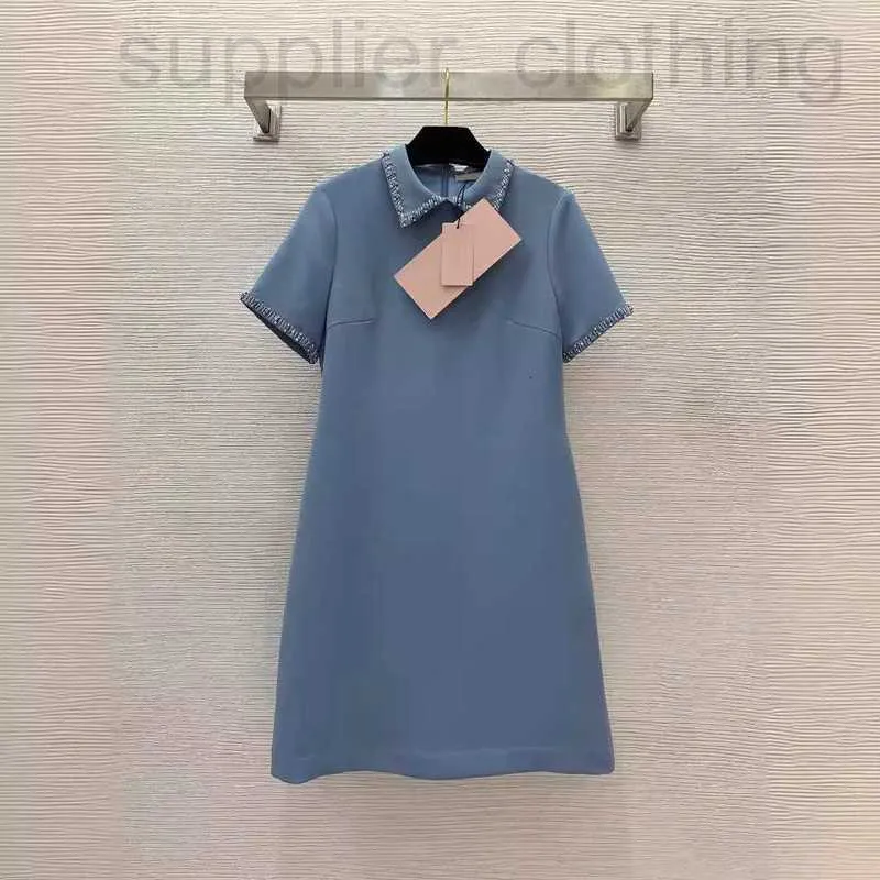 Basic & Casual Dresses designer Early spring and summer new style dress with a lapel short sleeves for slimming effect. Heavy duty diamond studded beaded side pocketsIJ