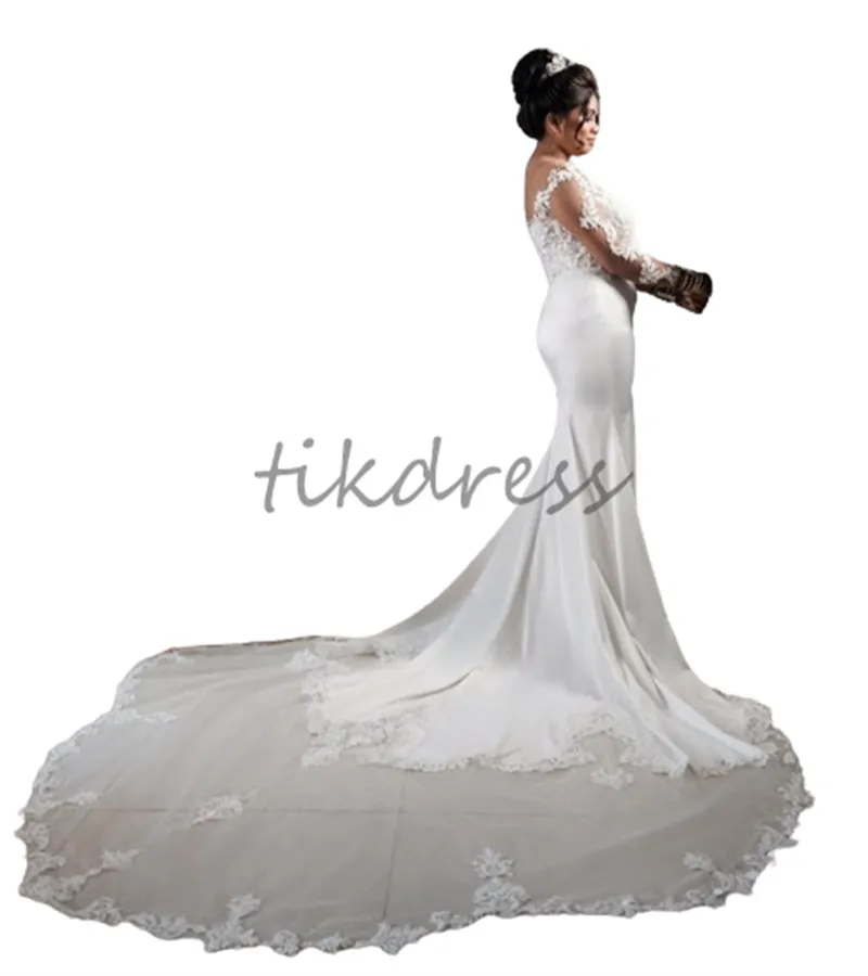 Robes de mariée de sirène de luxe 2024 Appliques d'illusion en dentelle Lace Lace Sobre Bridal à manches longues pour femmes noires