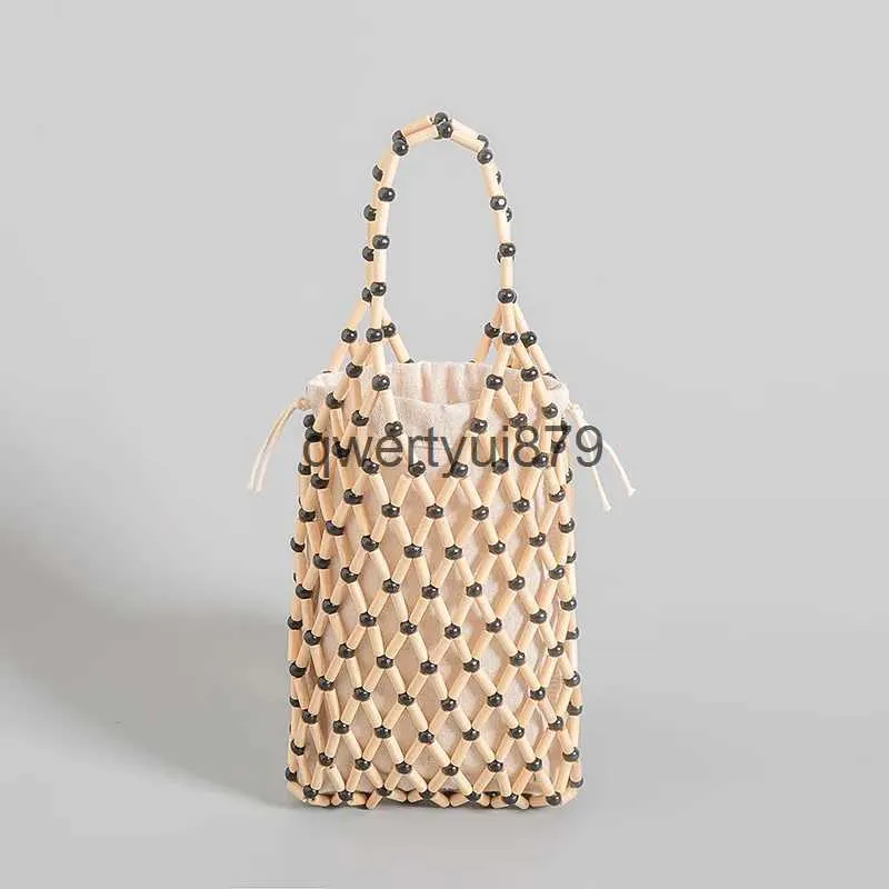 Shoulder Bags Fasion ollow Beading Women andbags Designer Wooden Soulder Casual Fisnet Summer Beac Small Tote Bag Bali Purses 2023H2421