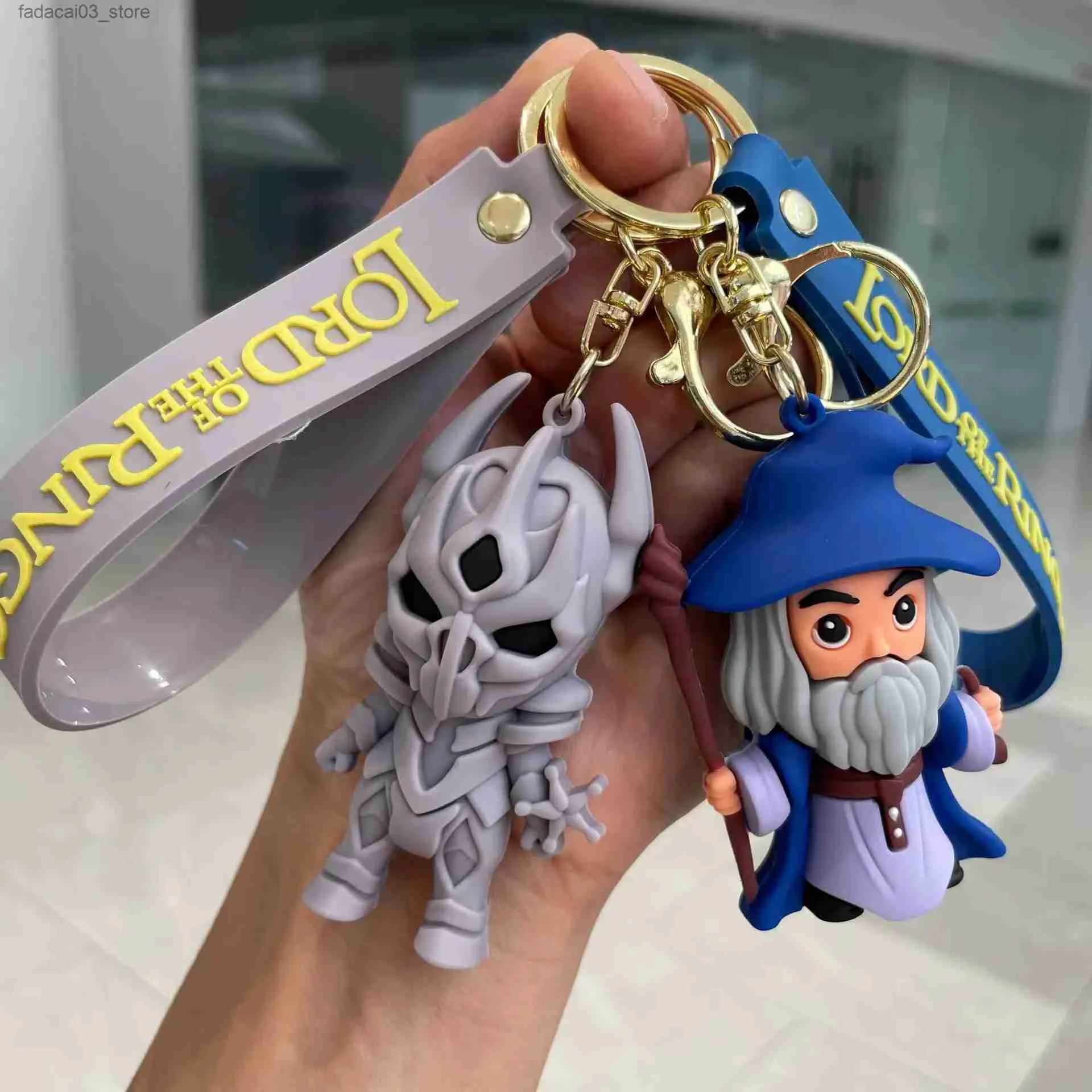 Keychains Lanyards Movie Lord of the Finger Rings Keychain Anime Doll Figur Keyring Pendent smycken bil nyckel Tillbehör leksak för barn födelsedagspresent Q240201