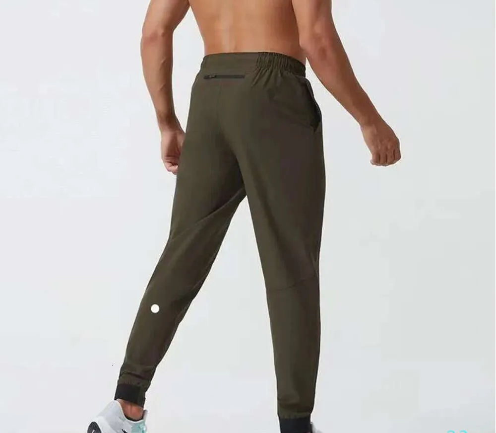 LL Mens Jogger Long Pants Sport Yoga Outfit Quick Dry Drawstring Gym Pockets Sweatpants Trousers Casual Elastic Waist Fitness Designer Pant Mens