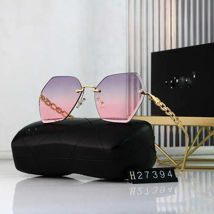 2024 Frameless large frame female sunglasses printed Xiaoxiang new glasses