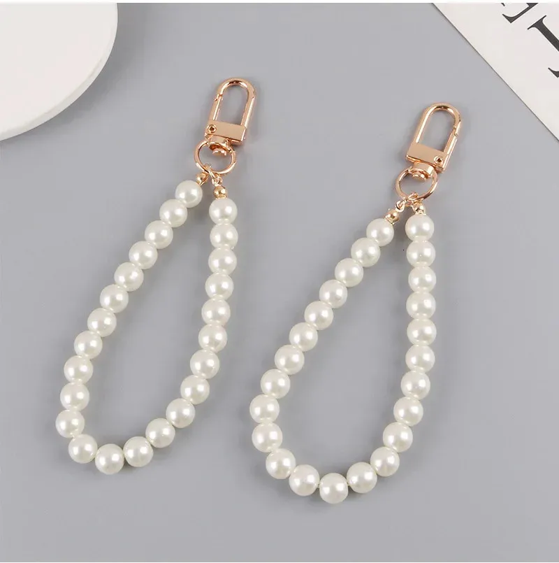 Porte-clés en alliage de perles pour femmes, 10 pièces, nouveau sac de voiture minimaliste, Bluetooth, couvre-chef, pendentif, bijoux, vente en gros, 240125