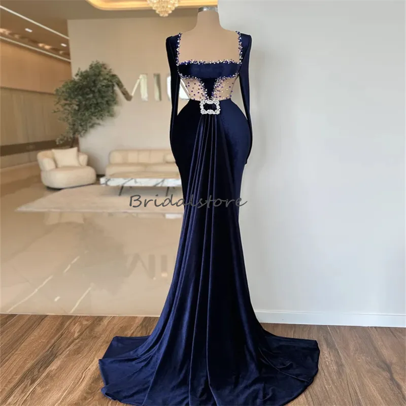 Blue Strapless Evening Gown with Beaded Crystal Embellishments and Sheer Neckline