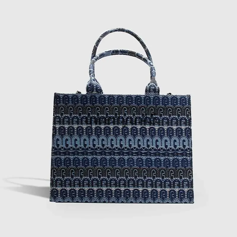 Sacs à bandoulière Sac fourre-tout de luxe Designer et sacs pour femmes Bourse 2023 Nouvelle mode broderie Paern Commuter Computer Big SoulderH2422