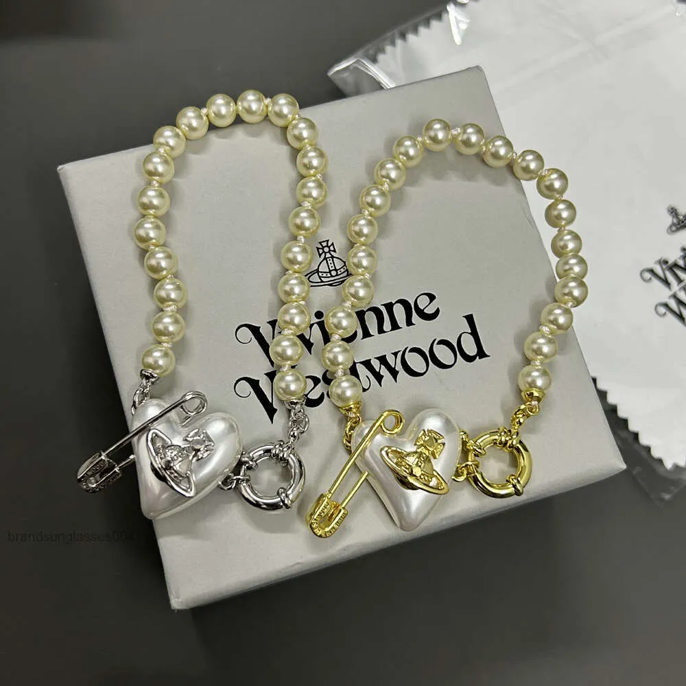 Designer di gioielli di lusso VivenWestwoods Satellite Viviane Westwood 23 Western Empress Dowager Pearl Love Pins Bracciali Donna Luce Lusso Piccolo e popolare S