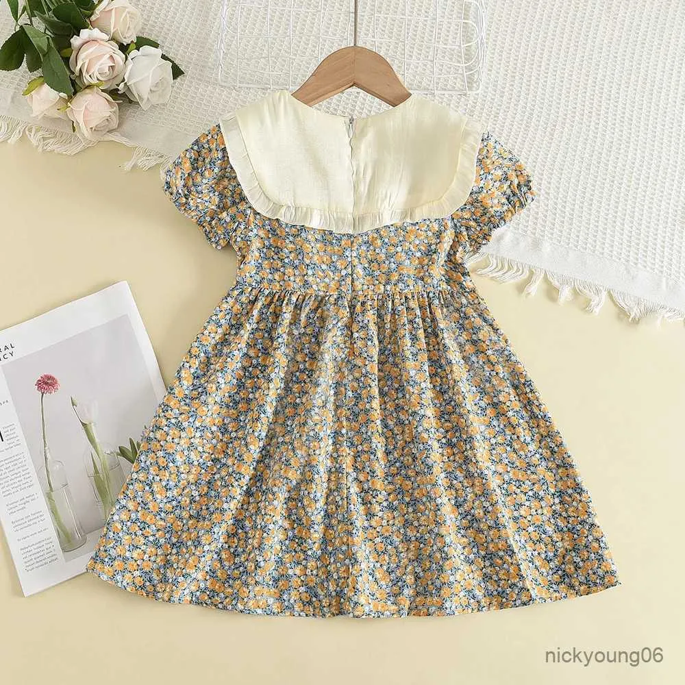 Mädchen lässt die lässigen Sommermädchen Blumenkinder Kleidung Bogen Patchwork Baby Prinzessin Kleid neue Blumenmädchenkleider