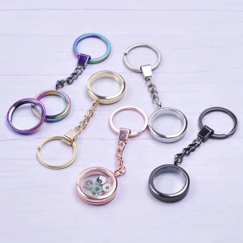 Nyckelringar Sleutelhanger Keychain för kvinnor/män Pendant Lockets nyckelring Fem färgtillbehör Llaveros Round Charm flytande locket