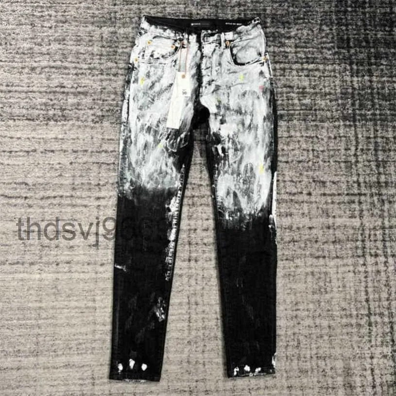Jeans da uomo viola tendenza pantaloni firmati di marca strappati dritti regolari larghi lavati vecchio buco lungo stack Rvmn ZM10