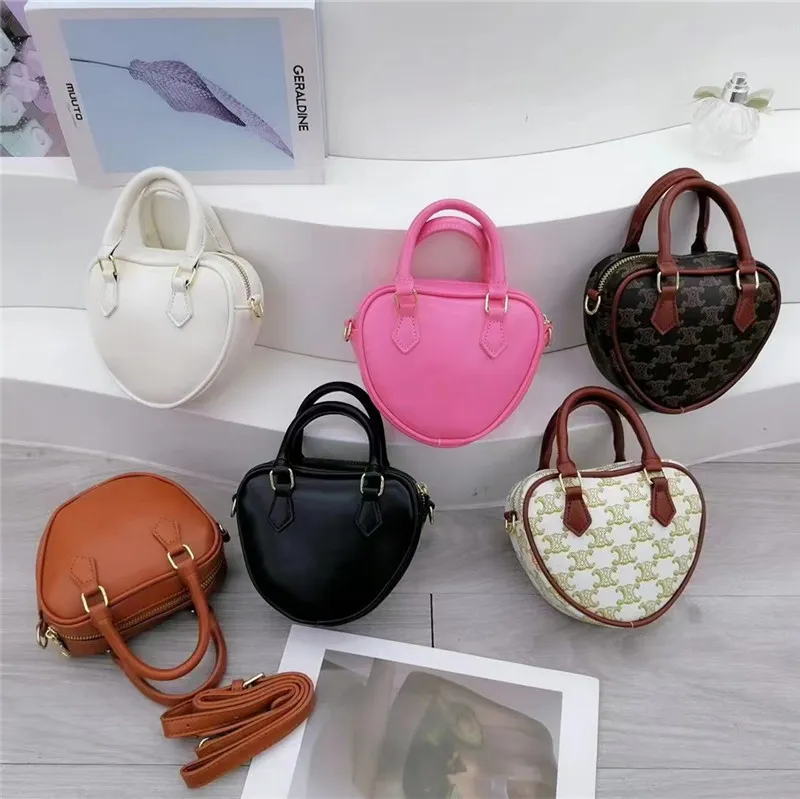 Crianças bolsas de designer mais recentes crianças coreanas cross-corpo sacos bebê meninas doces lanche sacos coração moeda bolsas adolescente mãe e me combinando sacos de ombro