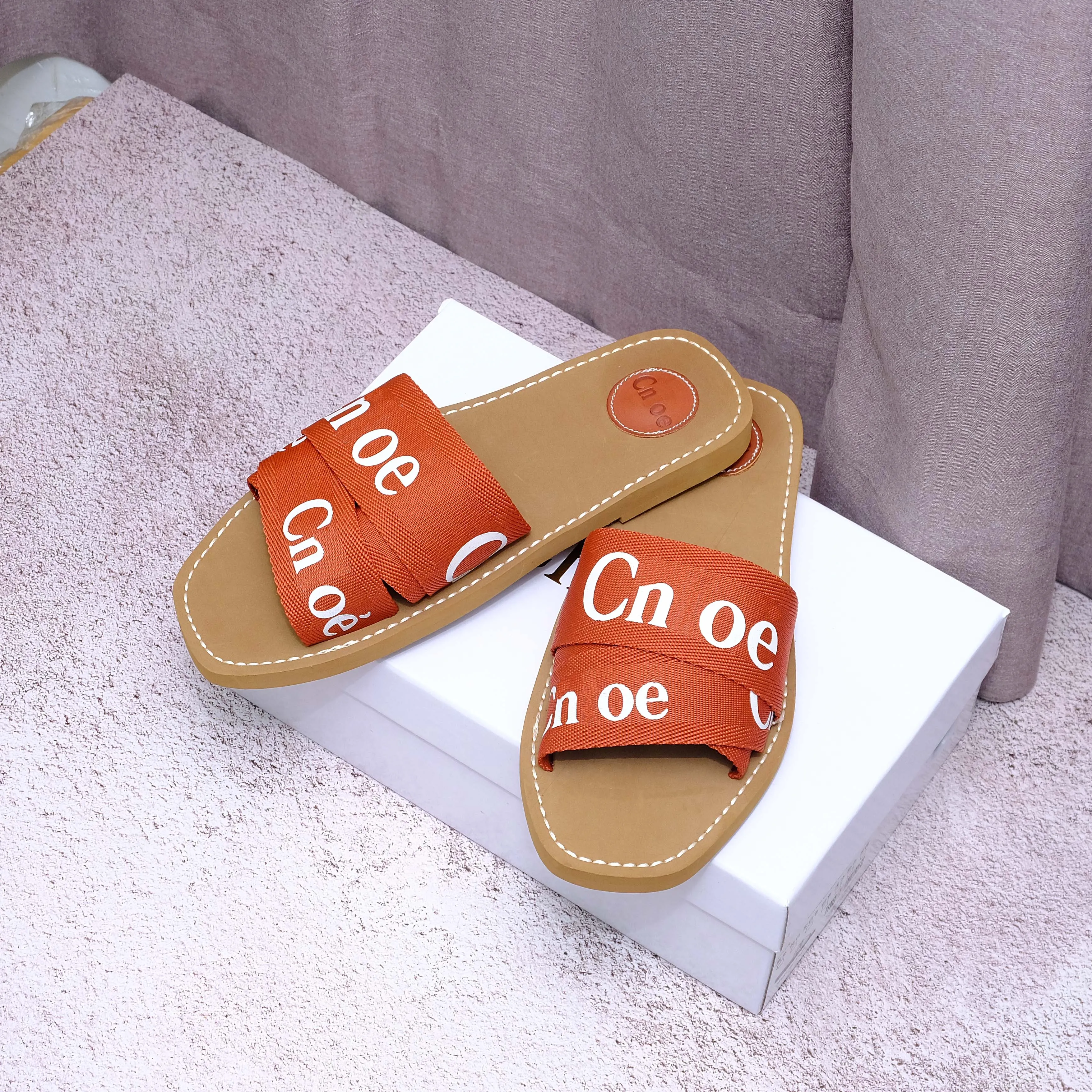 Sandales de concepteur de coachs Luxury Luxury Womeny's Woody Mule Sandales plates Sandales Lettre de glissade Lanqueurs Slippers Women's Pinks Summer Place Place Plateforme Canvas Herringbon 312