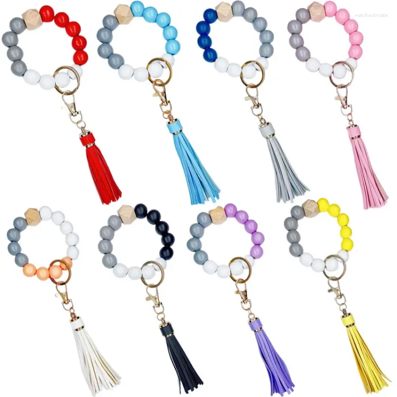 Charme pulseiras wangaiyao moda imitação de silicone grânulo pulseira faia frisado pulso chaveiro pingente artesanal franja de couro