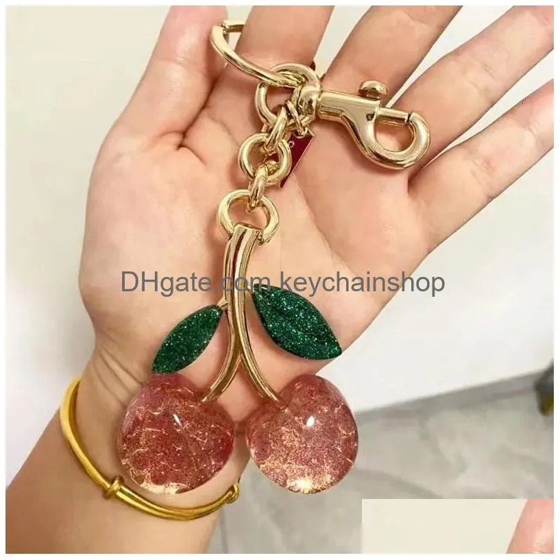 Anahtarlıklar Landards Keychains Landards Anahtar Yüzükler CoA Cher Cherry Anahtarlık Çanta Tahvi Dekorasyon Aksesuar Pembe Yeşil Yüksek Kalite Luxur Dhuxs