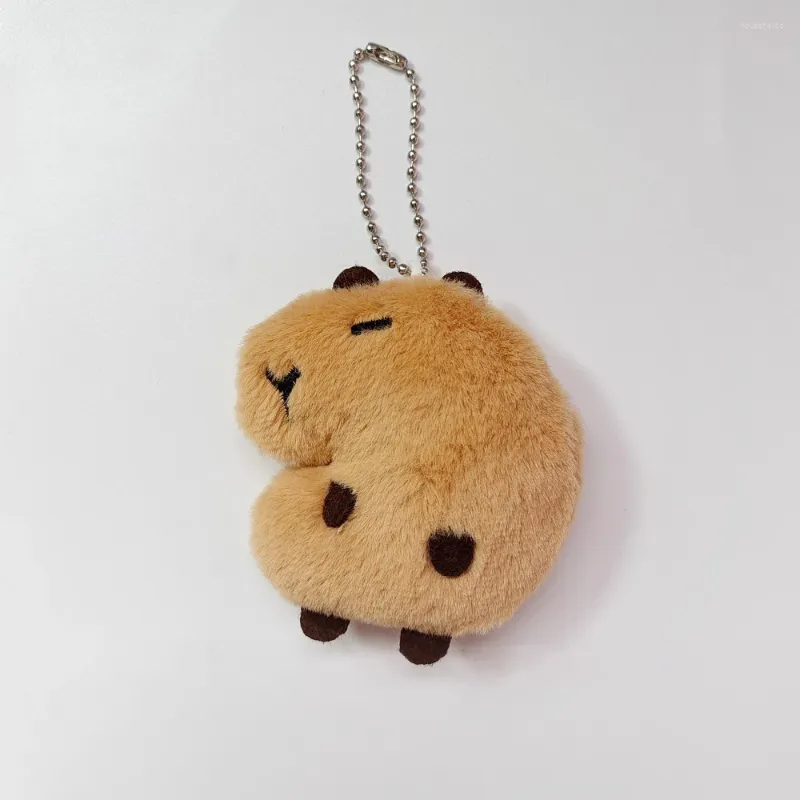 Nyckelringar Söt fylld Kapibara Keychain Plush Doll Squeak Toy Cartoon Animal Bag Charms bil nyckelkedja gåva för kvinnor flicka