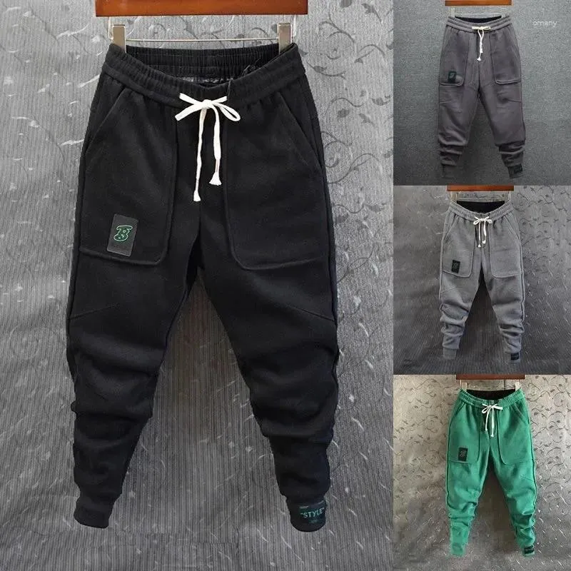 Herrbyxor spårar män 2024 Autumn Winter Sport Trousers Joggar Fleece Wool tjock varm utomhustrend smala små ben tröjor