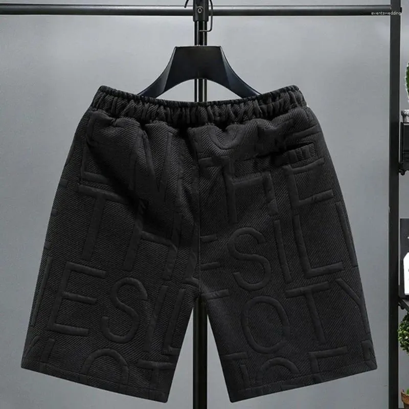 Mäns shorts Löst passande män som drabbas av Sport fast färg Elastisk midja över knälängd med fickor avslappnad dagligen för