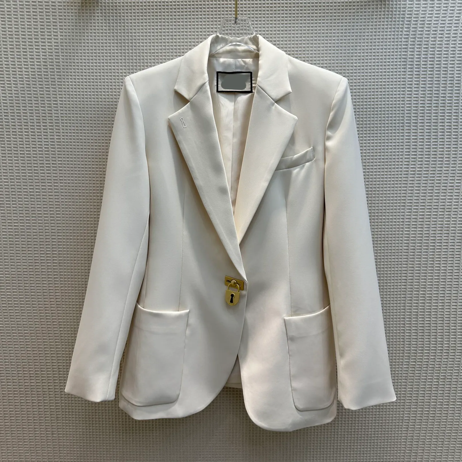 ヨーロッパのファッションブランドポロカラー長袖ゴールドバックル装飾スーツジャケット