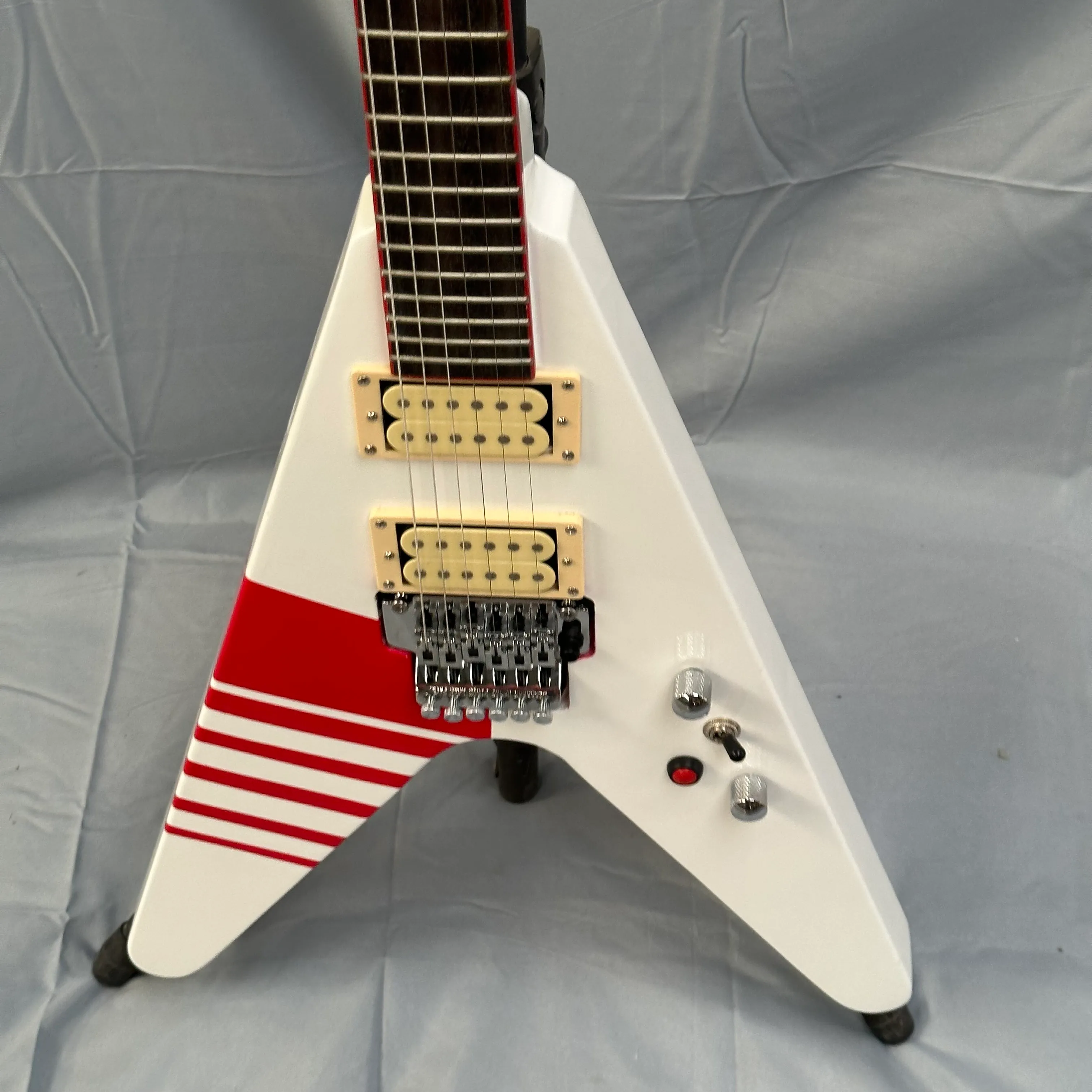 DHgate.com:Striking White V Electric Guitar with Red Stripes