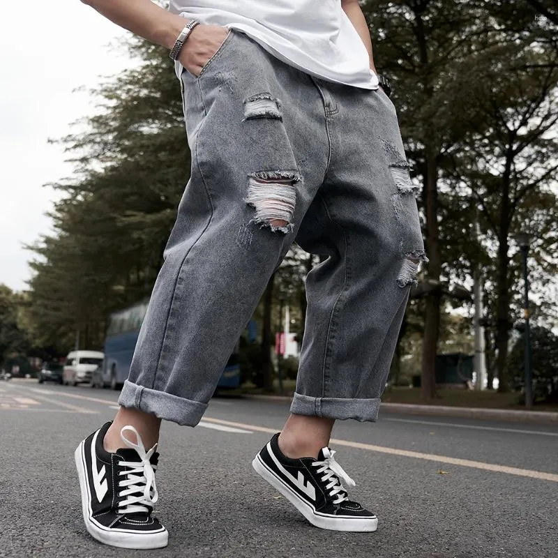 Męskie dżinsy plus rozmiar 32-48 dziury Wysokiej jakości szerokie spodnie nogi jeansowy szary kolor dziewiąty codziennie codziennie koreański