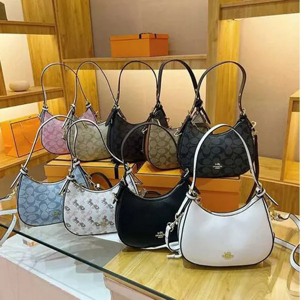 Bolso de mujer Bolso de diseñador clásico Nuevo bolso de mano para mujer Bolso de un solo hombro con letras impresas Bolso de media luna Tamaño del bolso de las axilas 22-17-9 cm