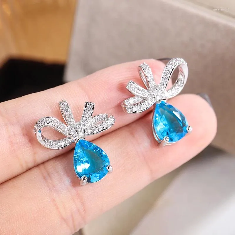 Pendientes de tuerca que venden circonita azul exquisita para mujer, joyería de fiesta a la moda, lazo, boda, novia