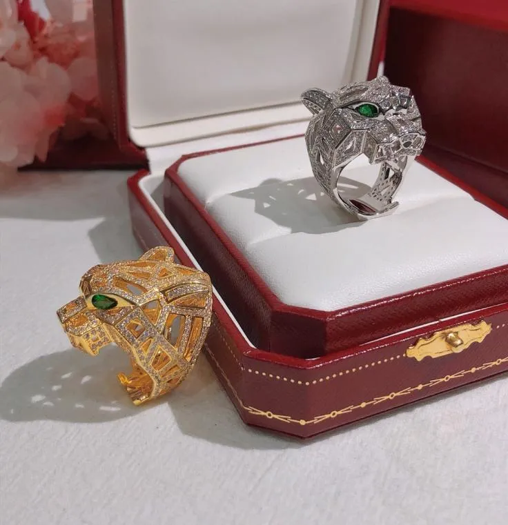 Il nuovo oro e argento scavato con diamanti pieni di diamanti con testa di leopardo anello di moda prepotente pseudo anelli d'oro come regalo4174348
