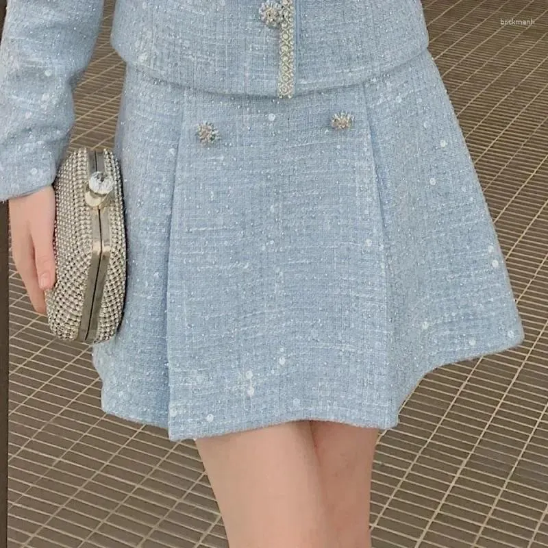 Юбки синяя шерсть с блестками модная застегнутая женщина мини -юбка