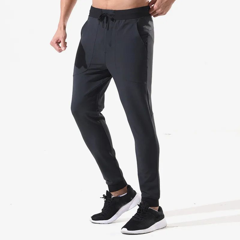 Lulumon Mężczyźni biegający spodnie do jogi joggery spodnie wiosenne jesienne jogging sporne spodnie luźne odzież domowa fitness oddychający spodnie męskie spodni 965