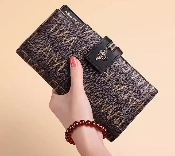 Kvinnor Anti -stöldborste långa plånböcker äkta läderkopplingar damer läderkorthållare plånbok med foto fällning stor kapacitet plånbok för telefon liten handväska