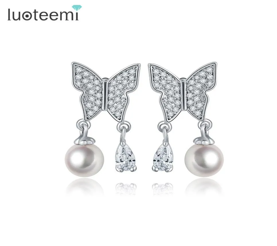 Luoteemi Nya högkvalitativa kvinnor Vackra damer Imitation Pearl Butterfly Design Silver Pin Ear Studs Earrings Party Jewelry2188314