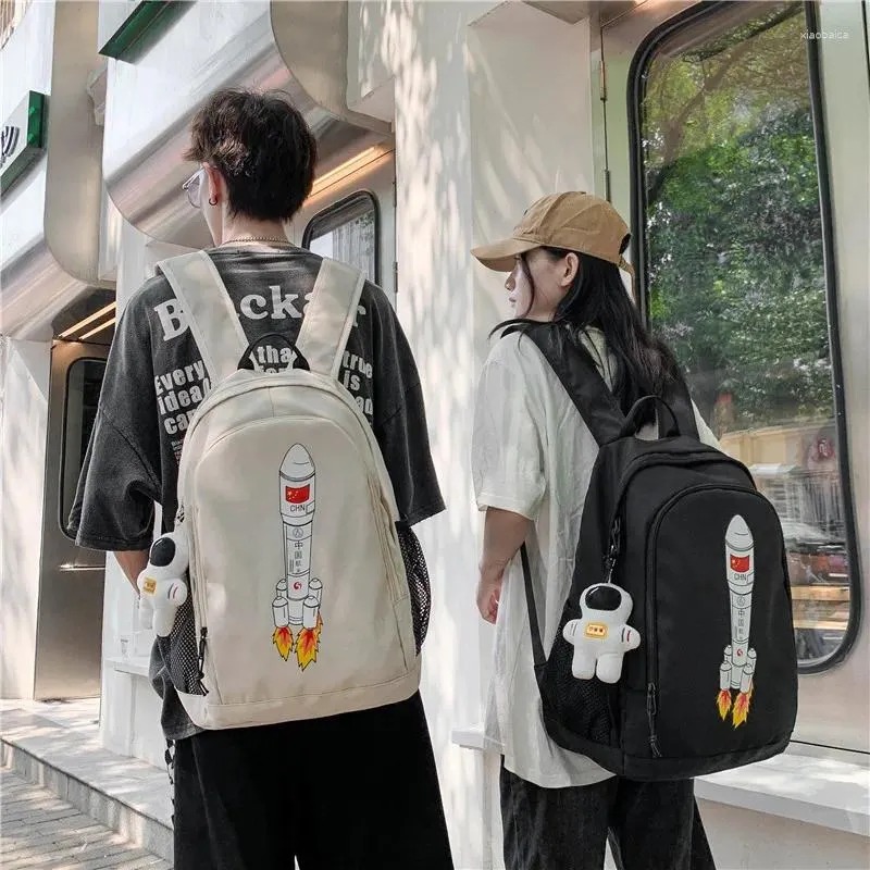 Sacs d'école Kawaii mignon dessin animé motif de fusée sac à dos unisexe et grande capacité étudiant Couple cartable pour envoyer pendentif de poupée